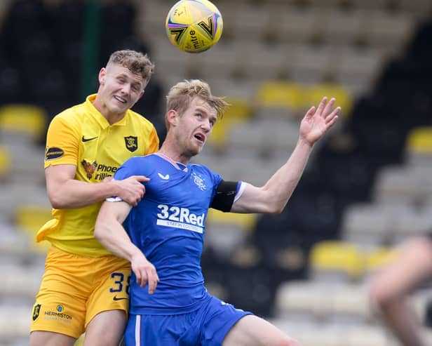 LIVINGSTON, SCOTLAND - AUGUST 16: Jack Hamilton of Livingston  battles for possession with Filip Helander of Rangers FC  during the Ladbrokes Scottish Premiership match between Livingston and Rangers at Tony Macaroni Arena on August 16, 2020 in Livingston, Scotland. (Photo by Willie Vass/Pool via Getty Images)