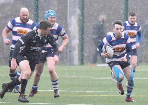 Centre Jack Todd makes a rare break for Howe. Pic by Chris Reekie.