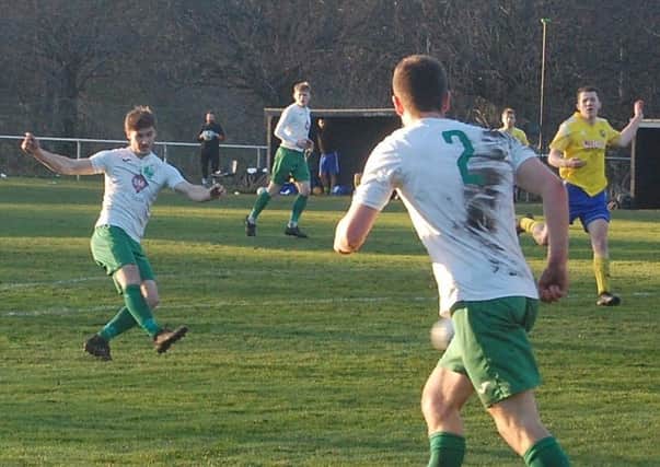 The more senior Garry Thomson  hits his second goal.