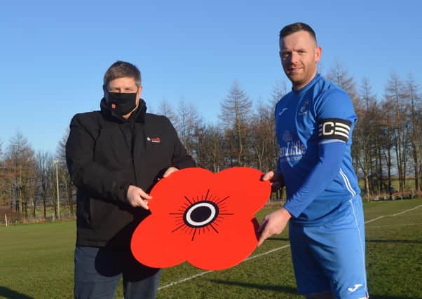 Kennoway Star Hearts donated a cheque for £150  to Poppy Scotland ahead of the weekend's game. Pictured is  skipper Ally Griffin with Gordon Mackie.