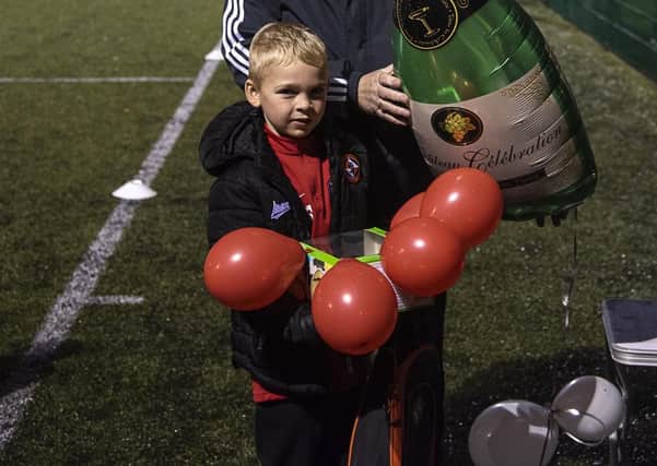 Excited youngster Murray Steedman helped AM Soccer reach a milestone