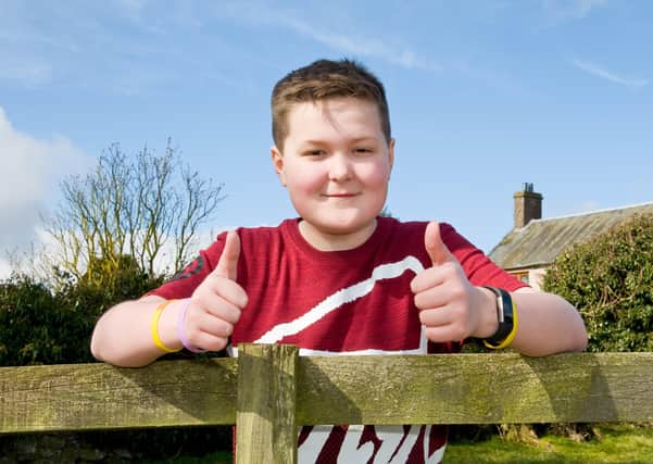 Toby was given the all clear in 2018 – but continues to provide support and raise funds.