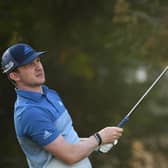 Connor Syme  tees off on the fourth tee during day one of the DP World Tour Championship at Jumeirah Golf Estates on December 10, 2020 in Dubai, United Arab Emirates. (Photo by Ross Kinnaird/Getty Images)