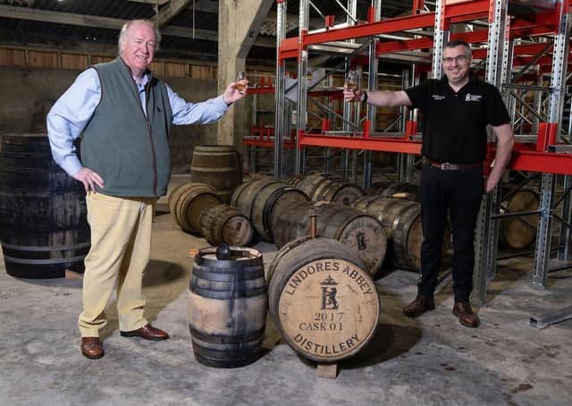 Drew McKenzie Smith, managing director and Lindores Distillery founder, with Gary Haggart, distillery manager. Pic: Tina Norris.