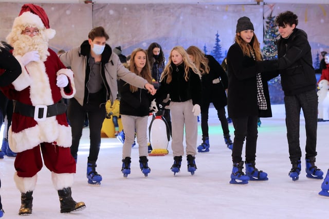Skaters and Father Christmas enjoying the ice rink. Picture by Neil Cooper.