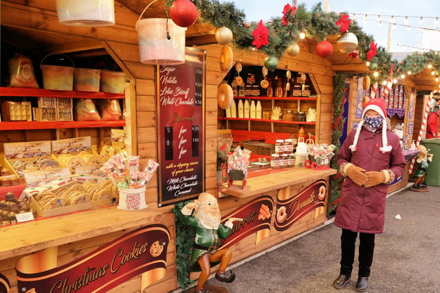 The market stalls sell a range of refreshments, including sweet treats, hot chocolate and Bratwursts. Picture by Neil Cooper.