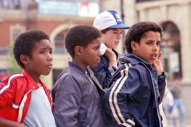 The original picture, from 1982, showed mates (left to right) Romell Yearwood, Ryan Wiltshire (now Rayan Abdel Raheem) and Stephen Moore on Cathedral Square. Mark Allan (wearing cap) moved away and was not available for the reunion picture.