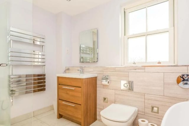 The communal bathroom at the three-floor home. The property also has two en-suite WCs.