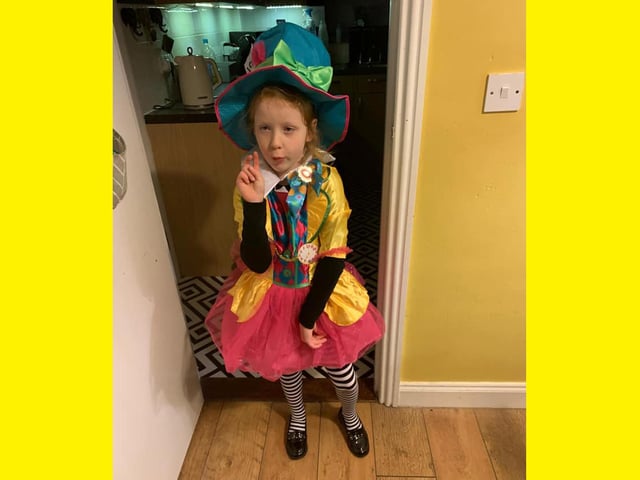 Lois as the Mad Hatter