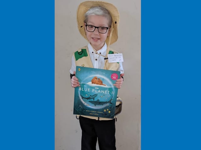 Four-year-old Jason's favourite book is Blue Planet 2 so he is dressed as David Attenborough