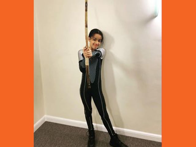Olivia Mboma aged 10 as Katniss from The Hunger Games