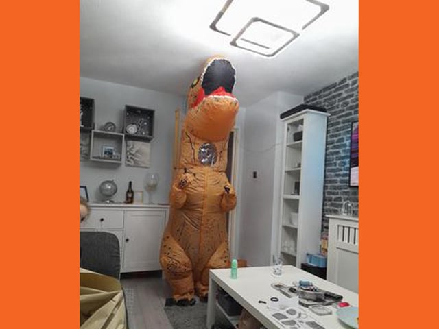 Jack Hoar, 11, as a dinosaur from Jurassic World