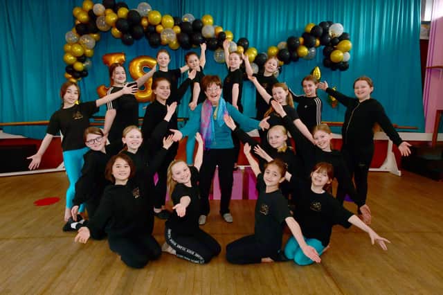 Janice Sutton (centre) back in the studio with her pupils.