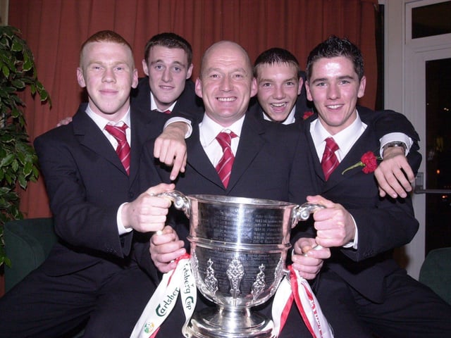 Gareth Mullan, Gary Ramsey, Paul 'Oxo' McLaughlin, Kevin Deery and Gareth McGlynn celebrate Derry City's 2002 FAI Cup win over Shamrock Rovers.
