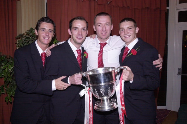 Floyd Gilmour, Paddy McLaughlin, Liam Coyle and Kevin Deery celebrating Derry City's 2002 FAI Cup Final win over Shamrock Rovers.