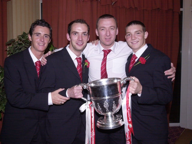 Floyd Gilmour, Paddy McLaughlin, Liam Coyle and Kevin Deery celebrating Derry City's 2002 FAI Cup Final win over Shamrock Rovers.