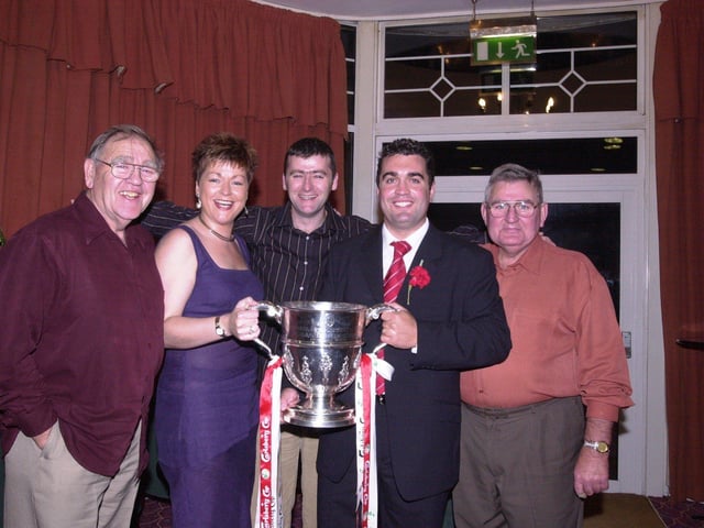 The Doherty family celebrate the cup win. From left, Larry, Dara, Lorcan, Gavin and Brian.