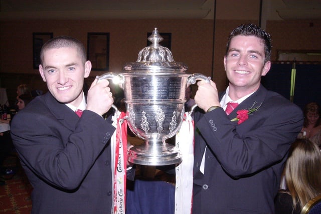 Borthers Tommy and Eddie McCallion holding the FAI Cup trophy, following their win over Shamrock Rovers.