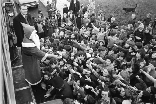 Children in Shantallow were thrilled when Santa Claus paid a flying visit in December 1976.