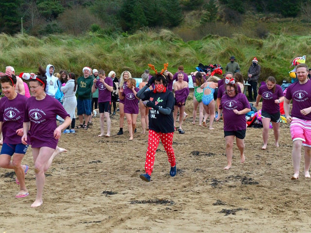 Group raising funds for Children’s Eye Cancer took part in the annual Christmas Day swim at Ludden beach, Buncrana. Photo: George Sweeney. DER2151GS – 031