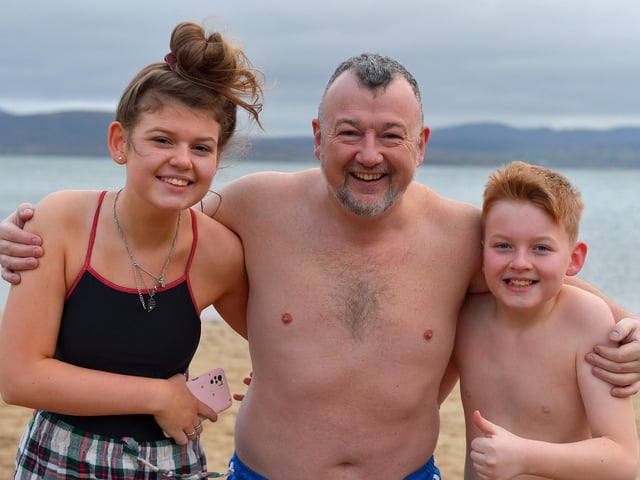 Aoibheann, Gerald and Cathair Oâ€TMKane took part in the annual Christmas Day swim at Ludden beach, Buncrana. Photo: George Sweeney.  DER2151GS â€“ 009