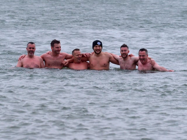 The inclement weather didn’t deter these lads from taking part in the annual Christmas Day swim at Ludden beach, Buncrana. Photo: George Sweeney. DER2151GS – 017