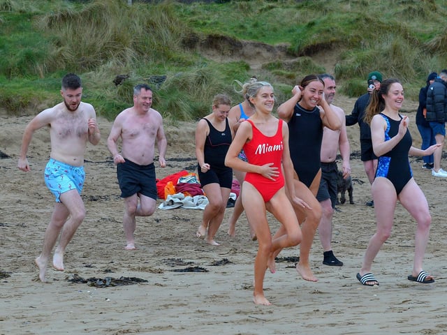 The cold conditions did not deter these swimmers from taking part in the annual Christmas Day swim at Ludden beach, Buncrana. Photo: George Sweeney. DER2151GS – 020