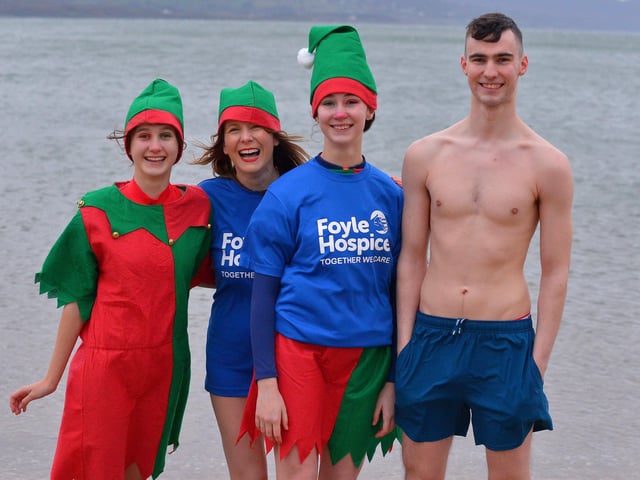 Derry locals Eva, Marie, Lara and Jude, raised funds for Foyle Hospice at the annual Christmas Day swim at Ludden beach, Buncrana. Photo: George Sweeney. DER2151GS – 021