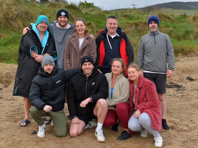 Smiling faces of dippers at the annual Christmas Day swim at Ludden beach, Buncrana. Photo: George Sweeney. DER2151GS – 011