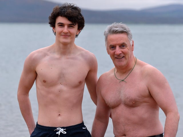 Daniel McAleer pictured with his dad Daniel at the annual Christmas Day swim at Ludden beach, Buncrana. Photo: George Sweeney.  DER2151GS – 029