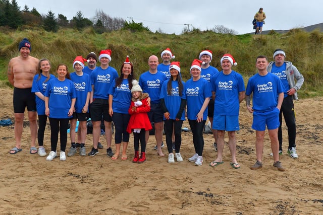 Group raising funds for the Foyle Hospice pictured the annual Christmas Day swim at Ludden beach, Buncrana. Photo: George Sweeney.  DER2151GS – 032
