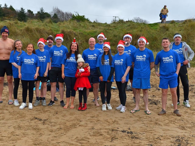 Group raising funds for the Foyle Hospice pictured the annual Christmas Day swim at Ludden beach, Buncrana. Photo: George Sweeney. DER2151GS – 032
