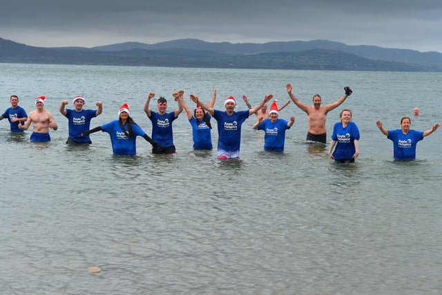 Group taking part in annual Christmas Day swim at Ludden beach Buncrana to raise funds for the Foyle Hospice. Photo: George Sweeney.  DER2151GS – 035