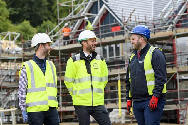 Pictured: Dale Lamont (Inchcolm Green Senior Site Manager), Scott Adamson (Adamson Doors) and Thomas Morgan (Realm Construction)