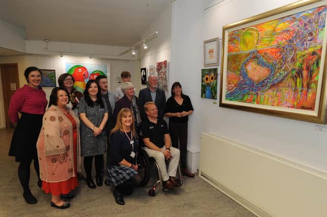 Winners of last year’s Fife Art Competition at the official opening of the exhibition.