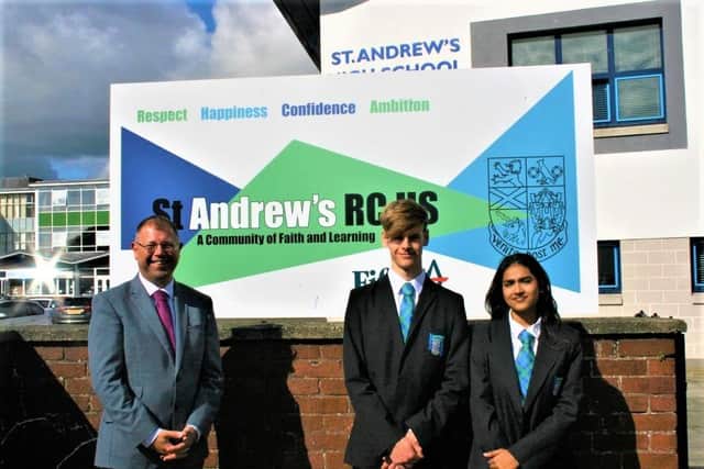 Pictured with Mr Callaghan, St Andrew's RC High's headteacher, are newly appointed Head Boy and Head Girl, Niall McCorquodale and Eileen Elias who together achieved eleven passes in their Higher exams.