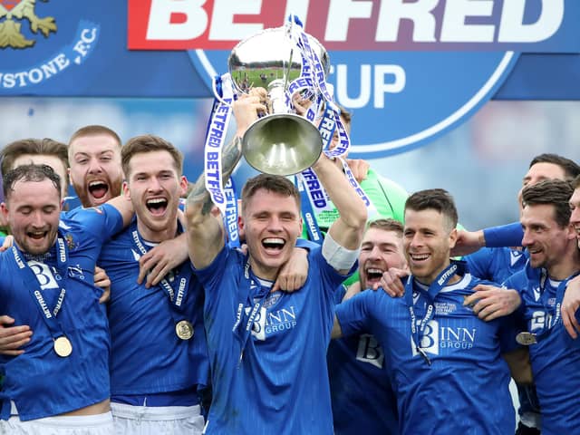 Jason Kerr of St Johnstone lifts the Betfred Cup after his side beat Livingston in the final at Hampden Park on Sunday (Photo by Ian MacNicol/Getty Images)