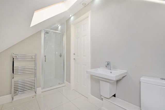 This shower room is ideal for growing families and has a Villeroy and Boch suite.