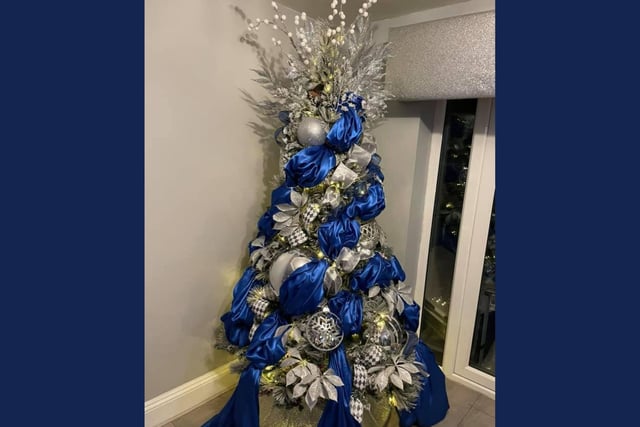 Beautiful blues and silvers on this Christmas tree.