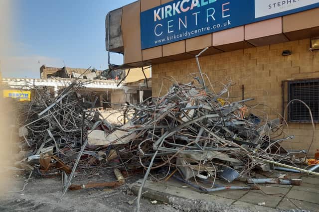 Piles of twisted metal are starting to grow as the building is torn down after standing for over 40 years in the heart of Kirkcaldy's town centre