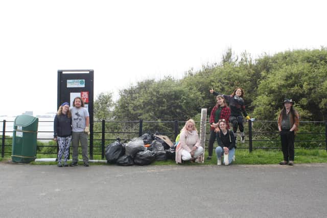 Seafield Beach clean-up: Some of the volunteers with the rubbish they had collected from the beach.