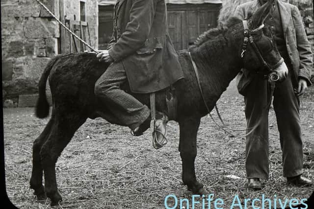 Jimmy Dickie and 'General' Gordon were local characters who appeared in many of George Normand's photographs.  (Pic: OnFife Archives)