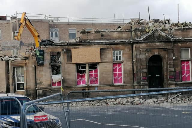 Demolition crews tear down the remains of the former Kitty';s nightclub (Pic: Fife Free Press)