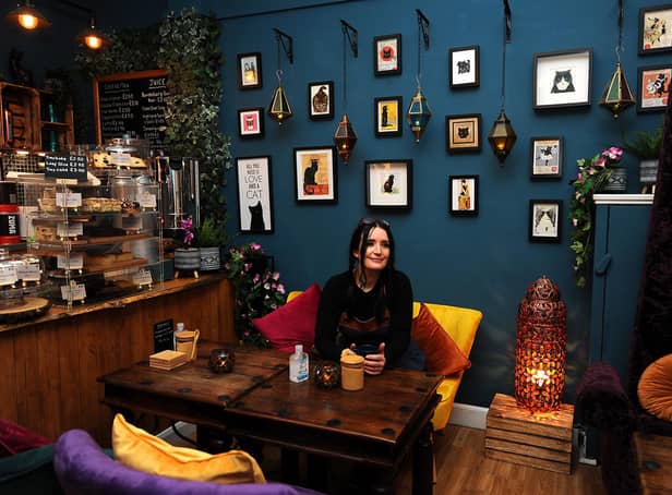 Owner of The Black Cat cafe, Valerie Birss, enjoying a cup of eco-friendly coffee. Pic: Fife Photo Agency.