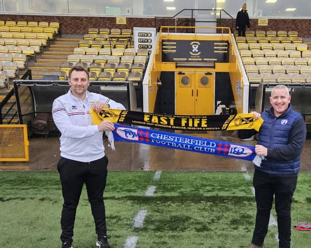 Mark Ashmore (right) exchanges scarves with East Fife boss Greig McDonald before watching game at his 42nd and final Scottish league ground