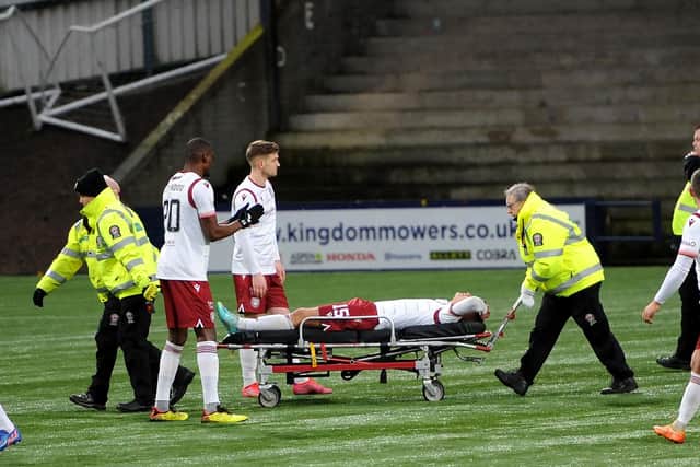 Dylan Tait of Arbroath is stretchered off (Pic Fife Photo Agency)