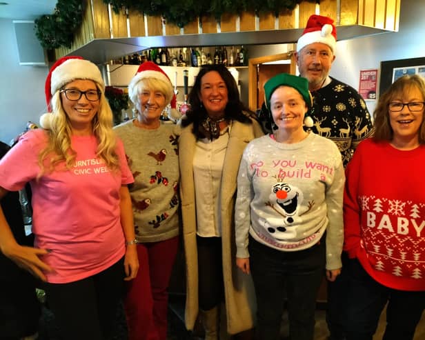 Councillor Julie MacDougall with members of Burntisland Civic Week's committee who had organised the Christmas Fayre at the Burntisland Sands Hotel.  (Pic: Submitted)