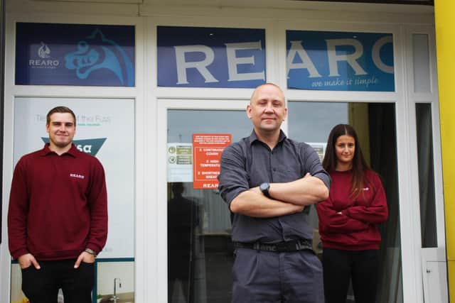 Outside Rearo Rosyth premises are (from left) Ryan Adams, assistant branch manager; Chris Douglas (branch manager) and Jane Stewart (sales and admin assistant)