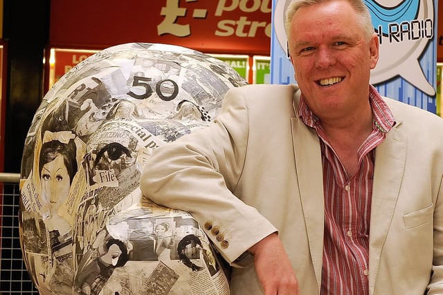 Allan Crow (editor, Fife Free Press & Glenrothes Gazette) with the 50th anniversary Glenrothes Gazette Hippo in 2013.