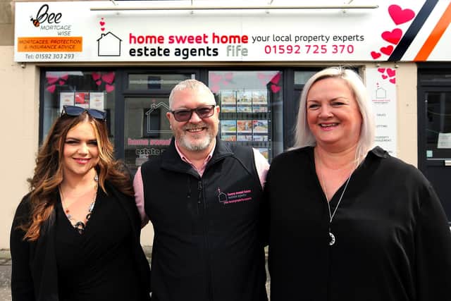 From left, Franki Cummings, of Bee Mortgage Wise, Scott & Shona Galloway of Home Sweet Home Estate Agents.  Pic: Fife Photo Agency.